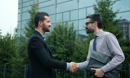 two men shaking hands